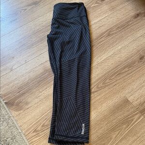 Reebok Black cropped Leggings with Thin greyPinstripes